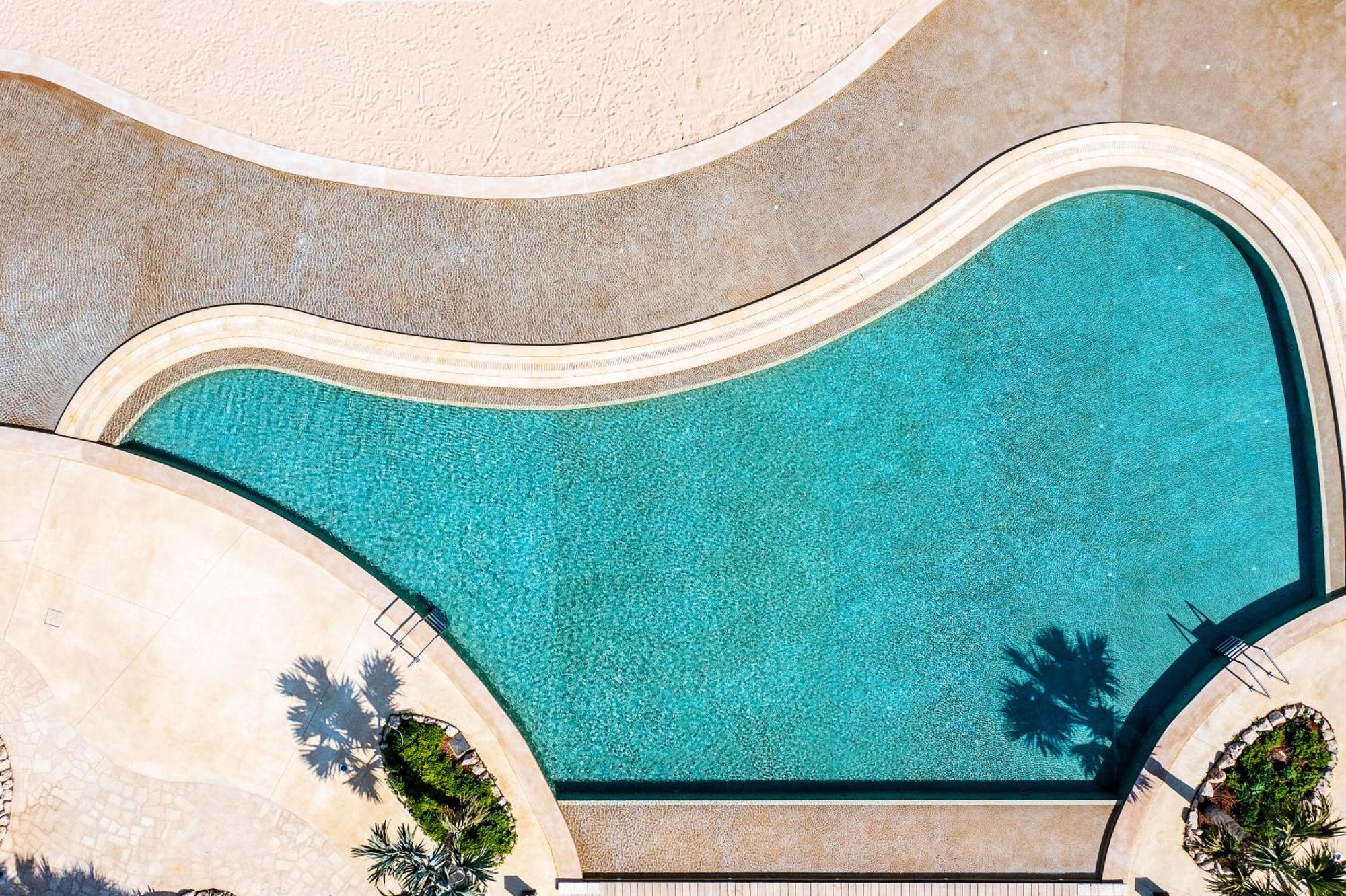 City Of Dreams Mediterranean - Integrated Resort, Casino & Entertainment Лимасол Екстериор снимка Aerial view of a swimming pool