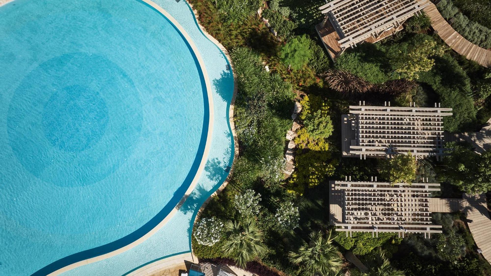 City Of Dreams Mediterranean - Integrated Resort, Casino & Entertainment Лимасол Екстериор снимка Aerial view of the pool